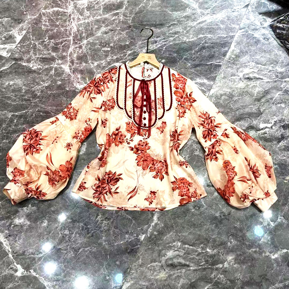 Áo nữ tay bồng phối hoa hiệu Dior cao cấp