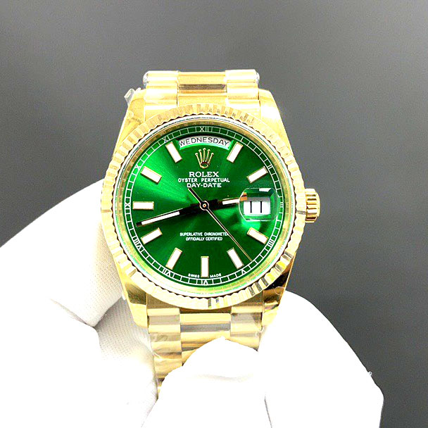 Đồng hồ Rolex mặt xanh vá phối vàng gold máy thụy sỹ
