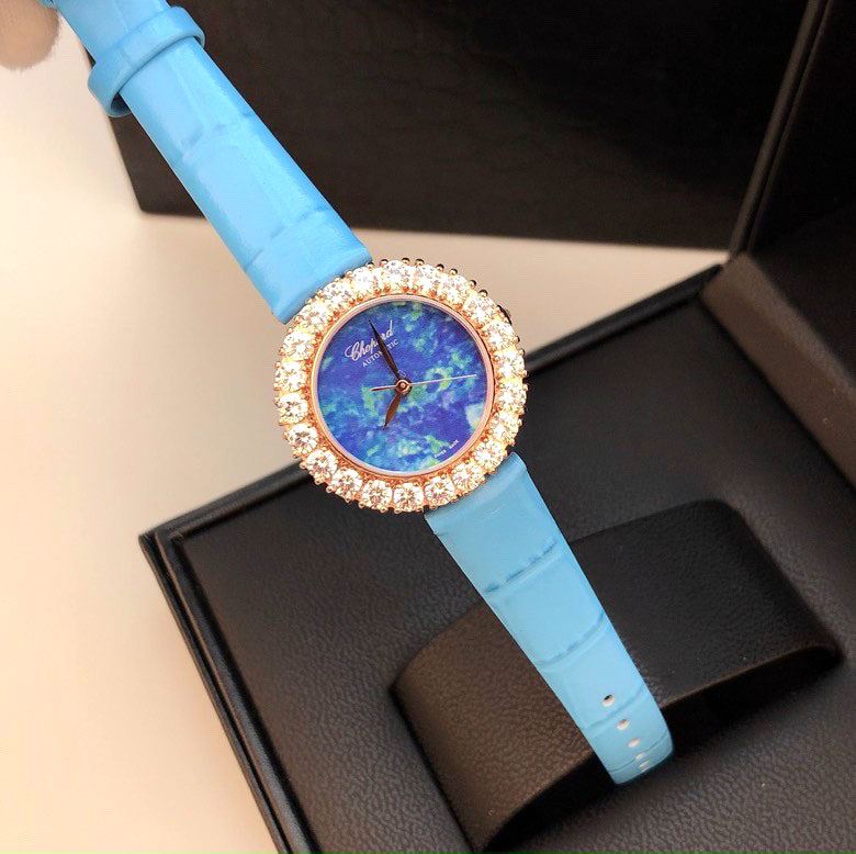 Đồng hồ nữ hiệu Chopard mặt tròn viền đá siêu cấp