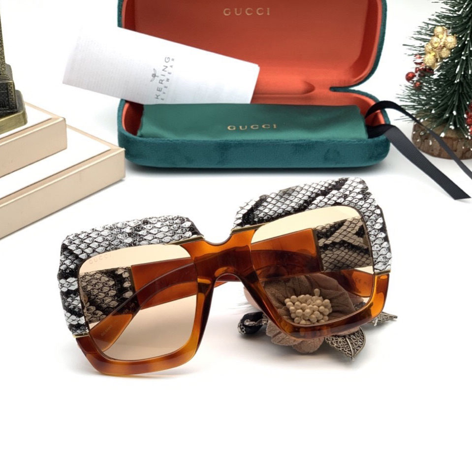Kính hiệu Gucci viền da rắn super