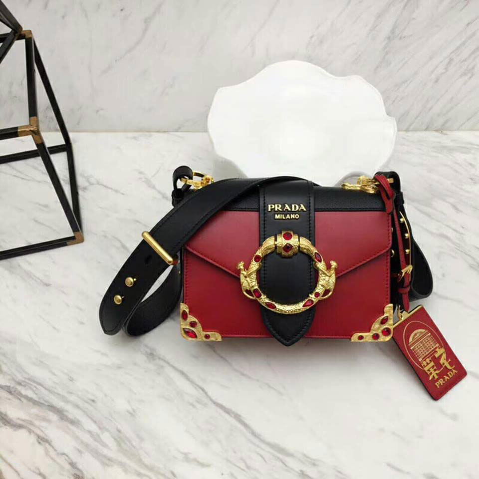 Túi xách Prada Likeauth logo phủ vàng đính đá