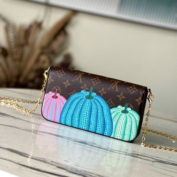 Túi xách bấm cúc hoa nâu họa tiết Louis Vuitton