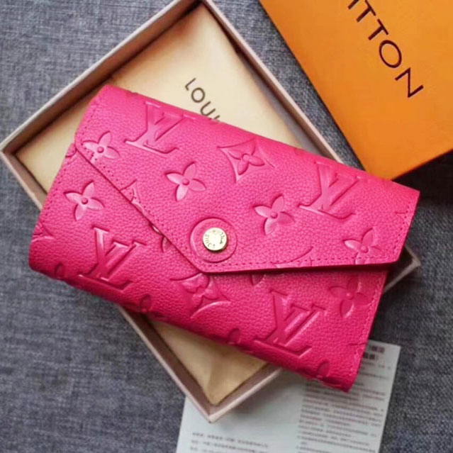 Ví cầm tay nữ hiệu Louis Vuitton super