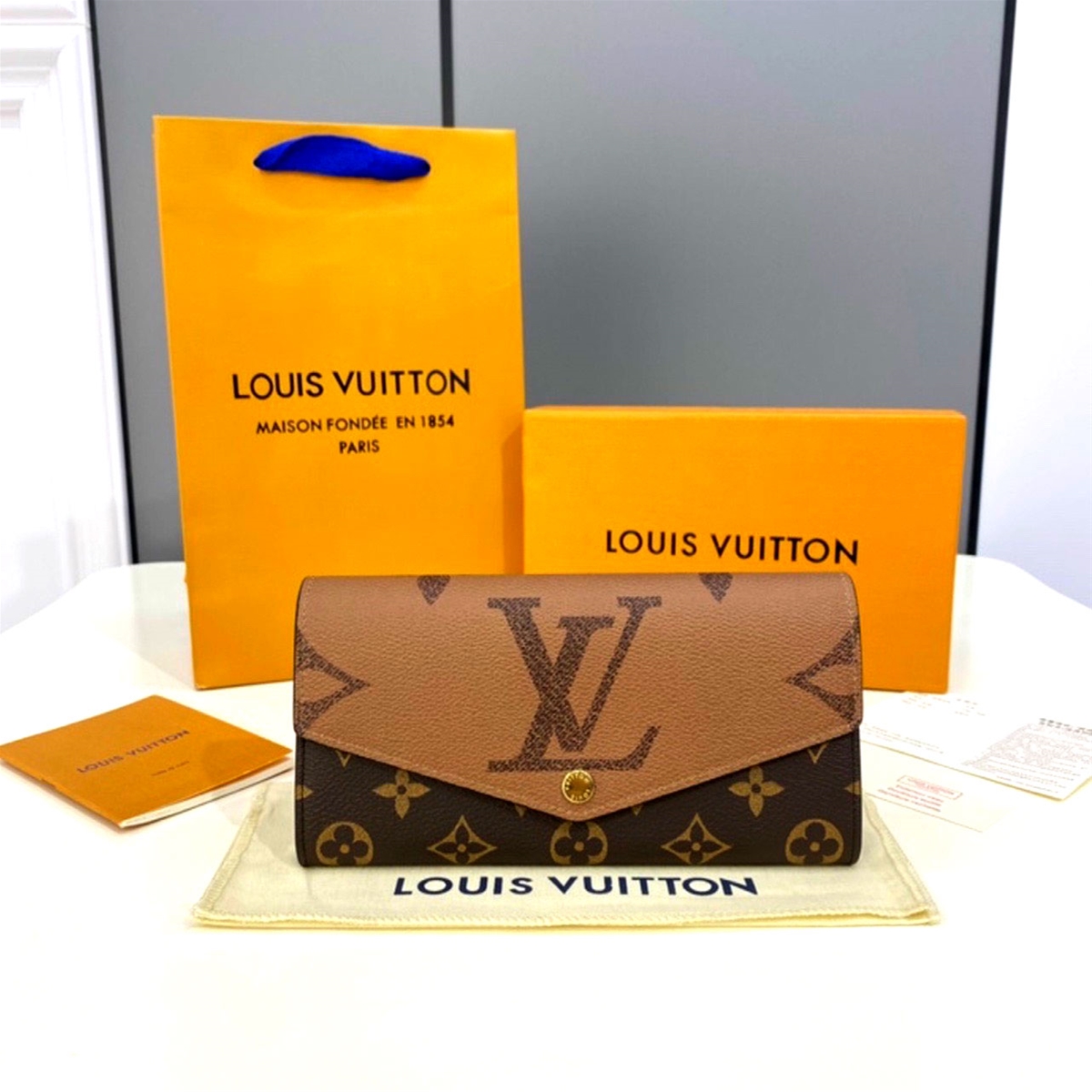 Ví nữ cúc bấm hoa nâu Louis Vuition siêu cấp